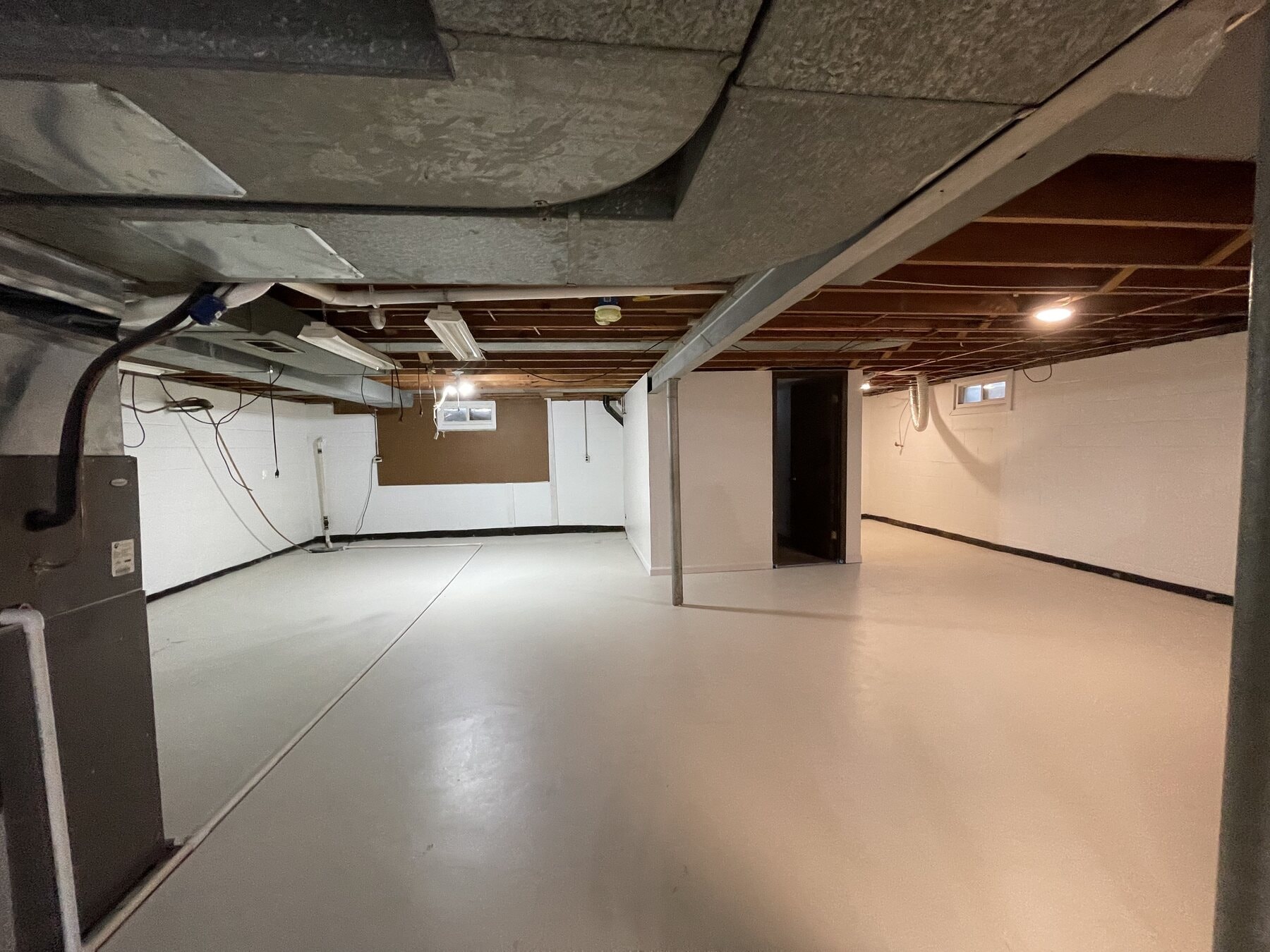 Finished lower-level room after the whole-house refresh